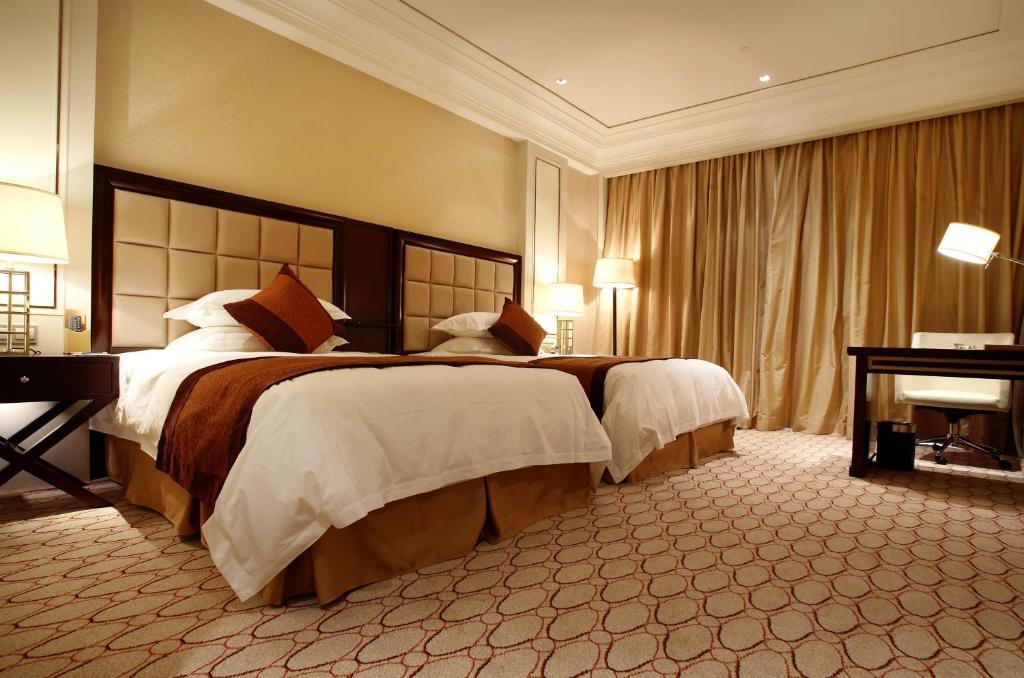 Landison Green Town Hotel Xinchang 部屋 写真