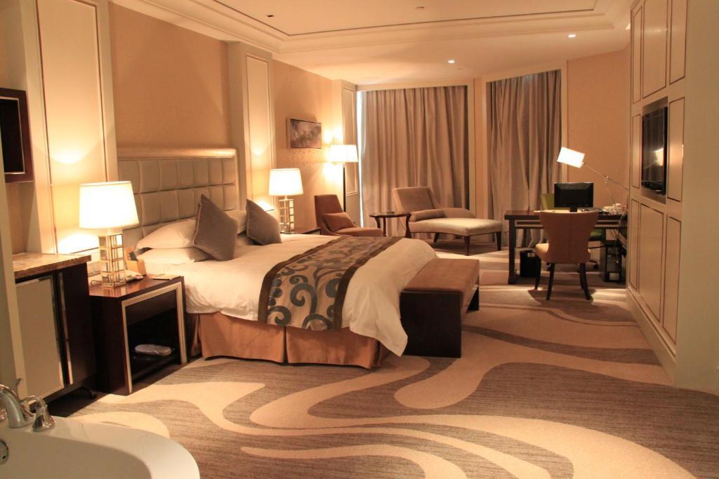 Landison Green Town Hotel Xinchang 部屋 写真
